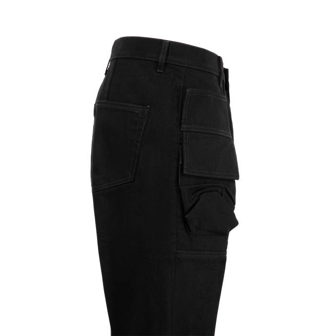 Image 3 of 3 - BLACK - Rick Owens Men's Cargo Bolan Cutoffs are crafted from 16 oz Japanese selvedge denim and feature a high-rise waist, slim fit, knee-length raw-cut hems, side slits, and an applied cargo pocket at the upper thigh. Designed with a concealed button fly, belt loops, pocket rivets, rear patch pockets, crotch whiskering, and pressed front and back leg creases, this style combines utility-inspired detailing with a streamlined silhouette. Main Material: 100% Cotton. Pocket Lining: 52% Polyester 