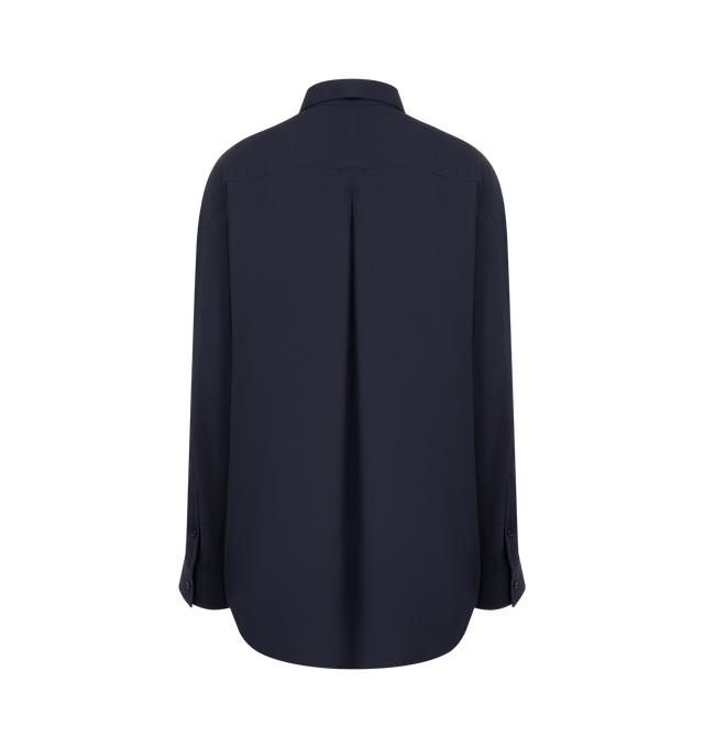 Image 2 of 2 - NAVY - TOTEME Classic Fluid Shirt featuring a longline, oversized silhouette with dropped shoulders and a buttoned placket and cuffs. 90% viscose, 10% wool. 