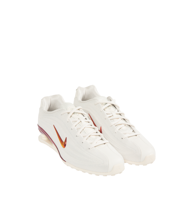 Image 2 of 5 - WHITE - NIKE Shox Z SE Sneaker featuring low-profile, slim, stitchless upper, iconic column design, vibrant Nike Swoosh, metallic accents and a modified, circular Waffle outsole. 