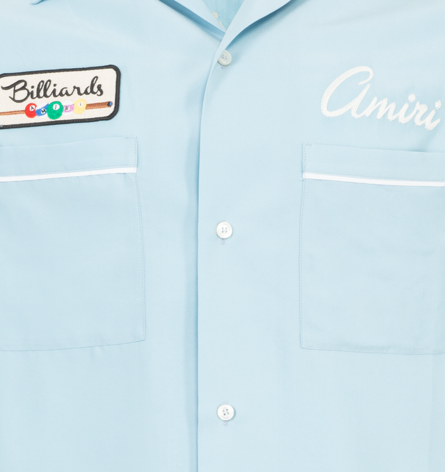 Image 3 of 4 - BLUE - Amiri Billiards Club Camp Shirt has a V-neck camp collar, a button front fastening, patch pockets, embroidery details and an embroidered patch on the chest. 100% modal. Made in Italy.  