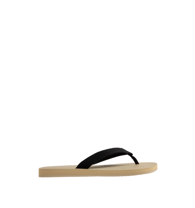 Image 1 of 4 - NEUTRAL - THE ROW Dune Flatform Sandal in Rubber featuring platform flip-flop, cotton grosgrain with textured footbed and lightweight rubber sole. 66% cotton, 34% viscose. Synthetic sole. Made in Italy. 