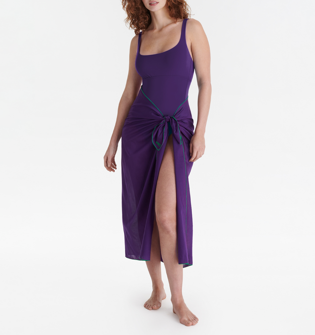Image 2 of 4 - PURPLE - ERES Cabine Sarong featuring contrasting trims and ERES logo in the lower right corner. Dimensions: 100x150cm. 100% Cotton. Made in Bulgaria. 