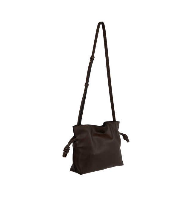 Image 2 of 3 - BROWN - LOEWE Flamenco Mini Napa Drawstring Clutch Bag featuring suede lining, coiled knot drawstring and hidden magnetic closure. 7"H x 9.4"W x 3.5"D. Convertible shoulder strap: 11 1/2" 23 1/2" drop. Nappa calf. Made in Spain. 