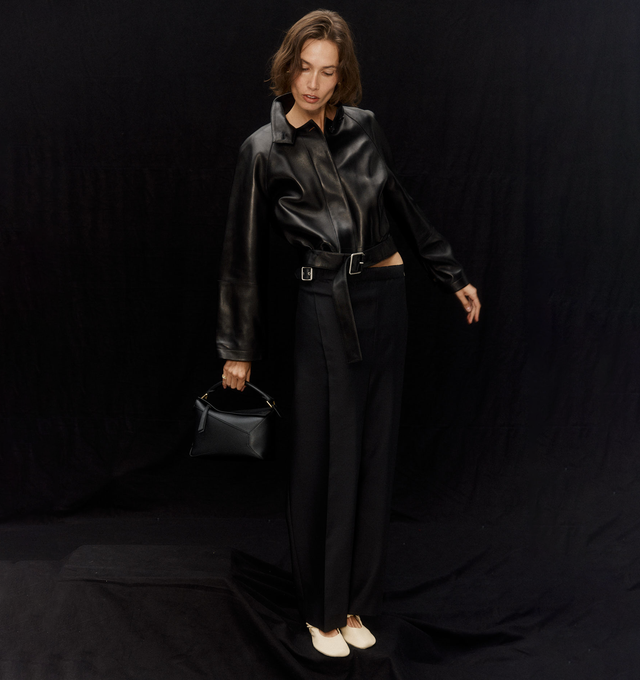 Image 2 of 6 - BLACK - Loewe Women's Trousers in medium-weight wool and silk tailoring featuring a gathered front with a leather belt detail. Regular fit, regular length, mid waist, straight leg, side zip fastening, seam pockets, buttoned rear jet pocket, pressed creases at the front, LOEWE embossed leather patch placed at the back. Wool/Silk. Made in Italy. 