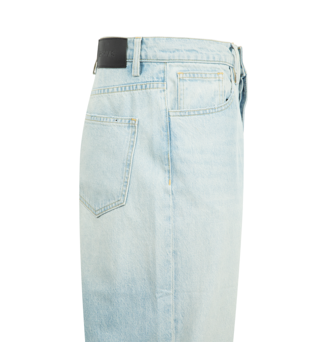 Image 3 of 3 - BLUE - NAHMIAS Light Wash Baggy Jeans featuring 5 pocket styling, baggy fit, button closure and leather patch on back. 100% cotton.  