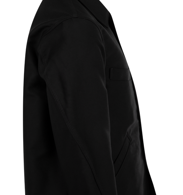 Image 3 of 3 - BLACK - Lemaire Twisted Sleeve Workwear Jacket features a point collar, a front button closure, button cuffs, chest pockets, and front welt pockets. Lined. 65% cotton, 35% polyester.  