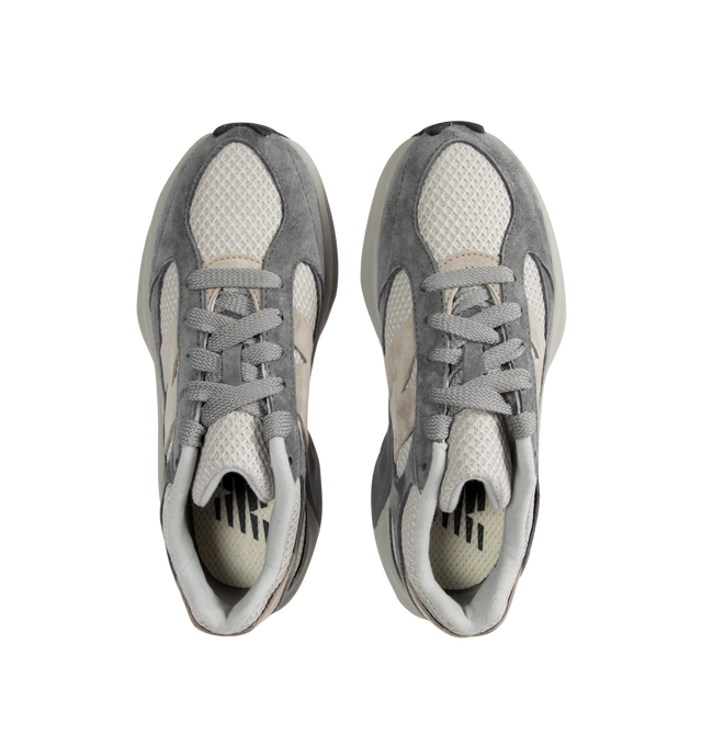 Image 5 of 5 - GREY - New Balance WRPD Runner Sneakers are a lace-up style with knit uppers, full-length Fuel Cell midsoles, wavy outsoles, embroidered N logos, and medial stability posts.  