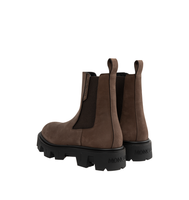 Image 3 of 4 - BROWN - MONCLER Peak City Nubuck Chelsea Boots featuring nubuck upper, leather insole, side elastic inserts, rubberized TPU sole and EVA midsole. Calf height 22 cm. Sole height 4 cm. 70% polyester, 30% elastodiene. Upper: cow. Made in Italy. 