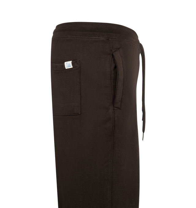 Image 3 of 3 - BROWN - Merz b. Schwanen Men's Authentic Fleece Straight Leg Sweatpants are crafted from 100% organic cotton and feature the brands heavyweight Authentic Fleece, a durable loopback fabric with a garment-dyed finish that creates a distinctive vintage-inspired look and feel. Details include side pockets, a single back pocket, an elastic waistband, and a cotton drawstring with metal aglets, finished with the signature swan loop label on the back pocket. Main Material: 100% Organic Cotton.  