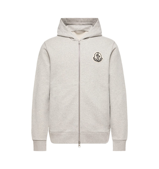 Image 1 of 1 - GREY - Moncler Mens Cotton Fleece Zip-Up Hoodie is crafted from cotton fleece and features a fixed hood, zip-front closure, side pockets, and a signature tricolor logo patch. This designer zip-up hoodie combines a classic hooded sweatshirt silhouette with soft cotton construction for comfortable everyday layering. Main Material: 100% Cotton; Hood: 100% Cotton; Hood Lining: 100% Cotton; Rib Trim: 95% Cotton, 5% Elastane. Made in Turkey. 