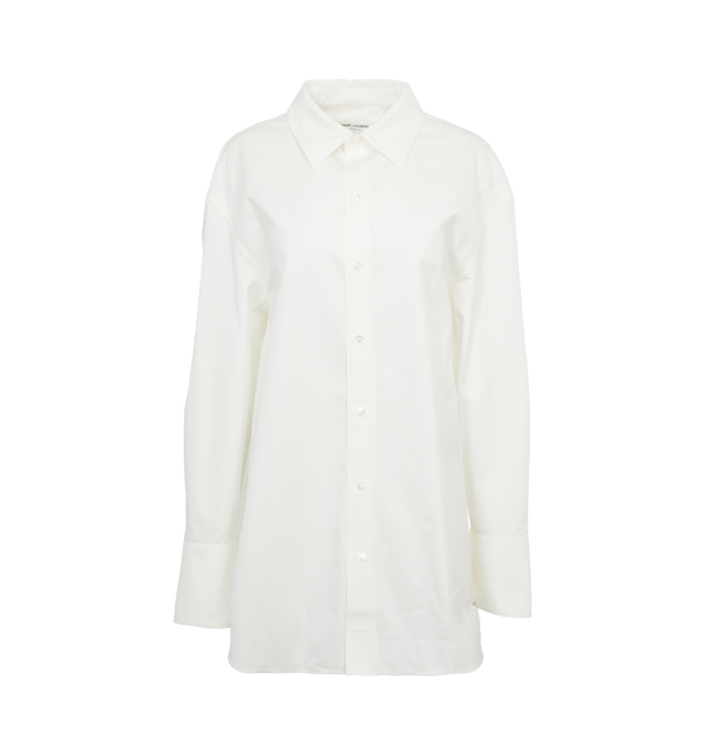 Image 1 of 3 - WHITE - Saint Laurent Oversized shirt crafted from organic cotton featuring pointed collare, drop shoulders, front-button closure, curved hem and concealed four-button cuffs. 100% cotton. Made in Italy.  