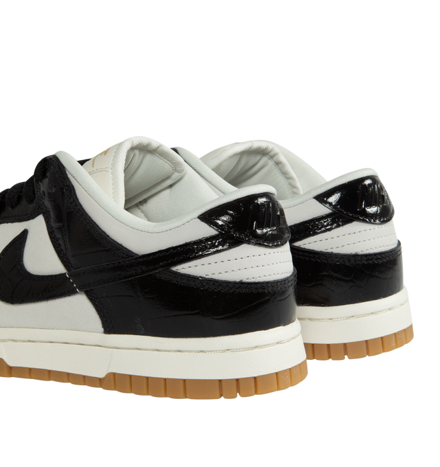 Image 3 of 5 - BLACK - NIKE Dunk Low LX Sneaker featuring lace-up front, signature Swooshes at sides, embossed Air logo at foxing, perforated toe and padded collar with debossed Nike logo at back counter. 