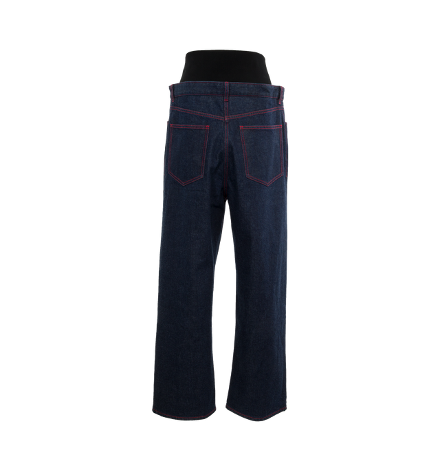 Image 2 of 4 - BLUE - ALAIA Knit Band Jeans featuring brut denim with knitted band, high waisted black figure hugging knitted belt, loose and straight fit, 4 pockets, Alaa dart details at the back and red contrasting upstitching. 99% cotton, 1% polyurethane. Made in Italy. 