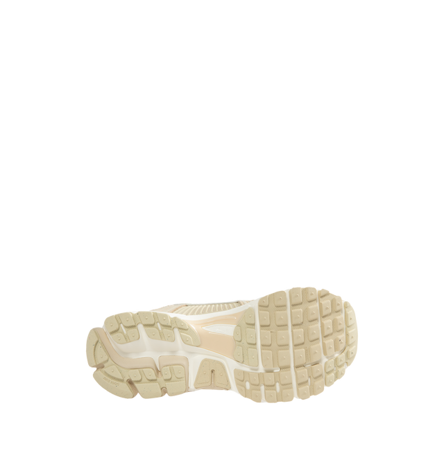 Image 4 of 5 - NEUTRAL - Nike Zoom Vomero 5 Sneakers are a lace-up style with real and synthetic leather uppers, mesh panels, ventilation ports, Zoom Air cushioning, plastic caging at the dies, and rubber outsoles.  