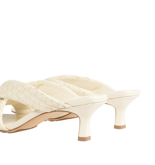 Image 3 of 4 - WHITE - BOTTEGA VENETA Riva Mule featuring kitten heel mule sandal in woven lambskin with padded tubular straps, twisted design and rubber-injected leather outsole. Heel: 2". Lambskin. Made in Italy. 