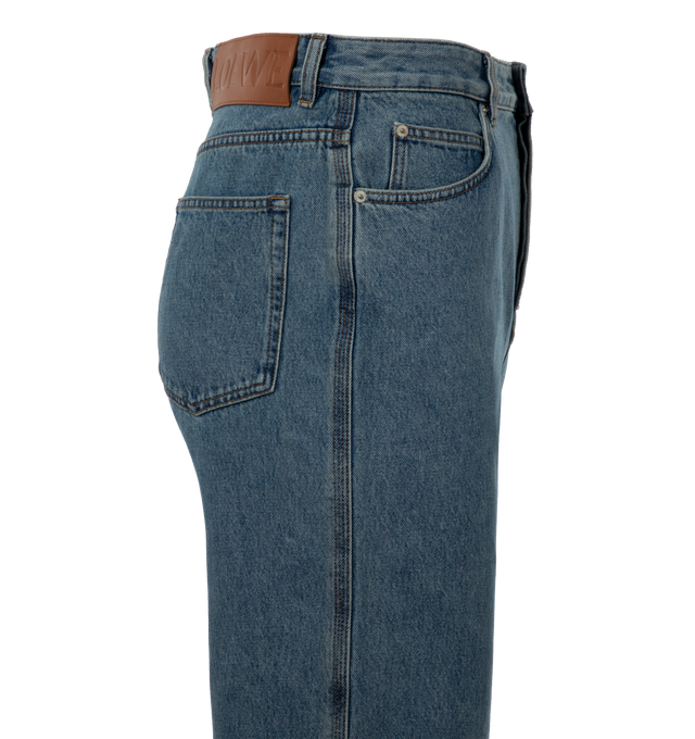 BLUE - Loewe Anagram Baggy Jeans crafted from medium-weight washed cotton denim with contrast Anagram cut-out at the front and contrast tobacco topstitching with signature four-row details. Five pocket sytle in a relaxed fit, regular length, low waist, loose leg, belt loops, concealed button fastening? and LOEWE embossed leather patch placed at the back. Made in Italy.