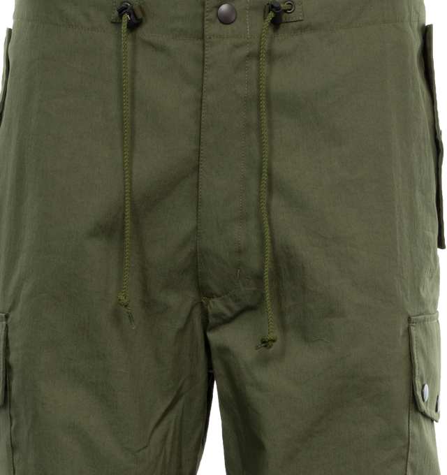 Image 4 of 4 - GREEN - NEEDLES Field Pants featuring drawcord waist and hem, flapped pockets, darting along the knee and five pockets. 100% cotton. Made in Japan. 