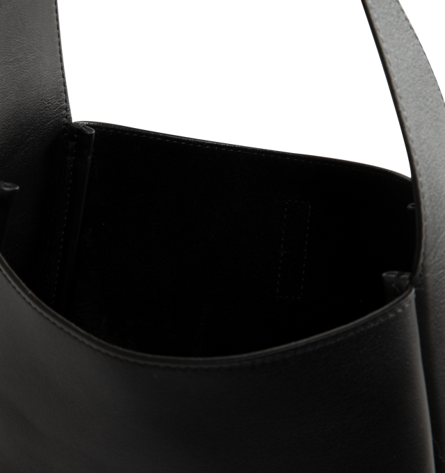 Image 3 of 3 - BLACK - Saint Laurent LE 5  7 small hobo in grained calfskin leather with suede lining. Featuring leather tab with small Cassandre, silver-toned hardware, interior zipper pocket and adjustable shoulder strap. Measures 23 X 22 X 8/5 cm with 21 cm strap drop. Made in Italy. 