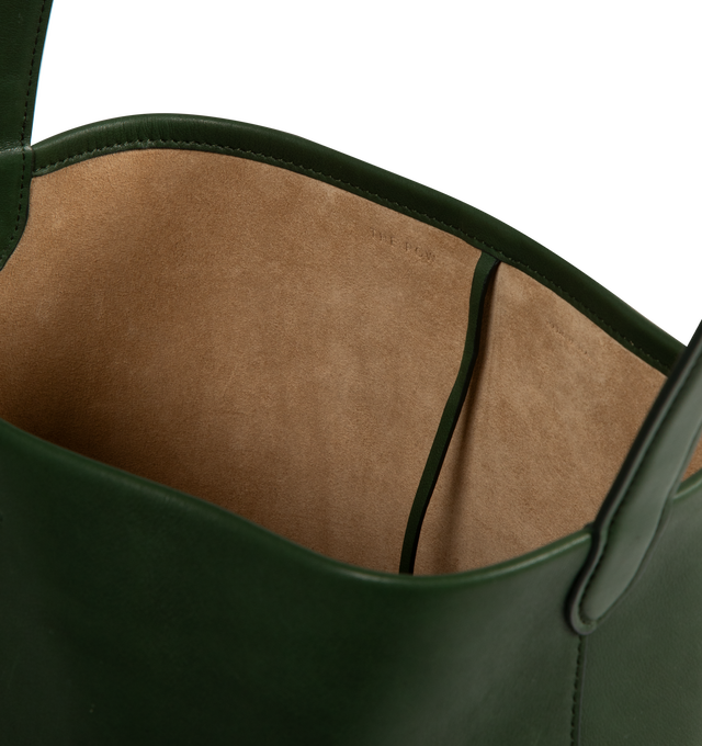 Image 3 of 3 - GREEN - THE ROW Park N/S Medium Tote Bag is crafted from supple leather and features a rounded shape, an interior toggle closure and top handle. 1" x 13" x 6". Leather. Made in Italy. 