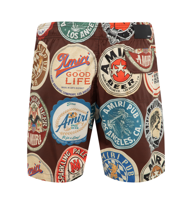 Image 2 of 3 - BROWN - Amiri Coasters Swim Trunks have an elastic drawstring waist, a graphic print design, and a back pocket. 100% polyester. Made in Bosnia.  