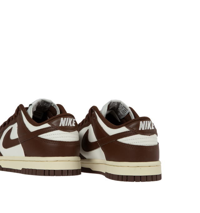 Image 3 of 5 - BROWN - NIKE Dunk Low LX Sneaker featuring lace-up front, signature Swooshes at sides, embossed Air logo at foxing, perforated toe and padded collar with debossed Nike logo at back counter. 