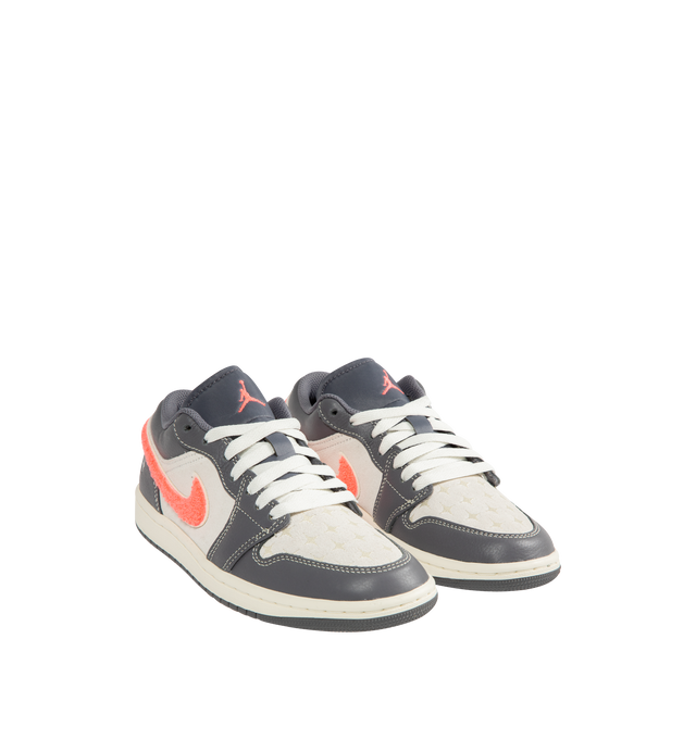 Image 2 of 5 - GREY - JORDAN Air Jordan 1 Low Sneaker featuring leather in the upper, encapsulated Nike Air-Sole unit, padded collar, low top and rubber in the outsole. 