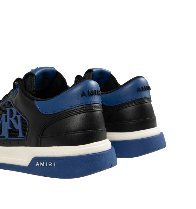 Image 3 of 5 - BLUE - AMIRI Classic Low Sneakers featuring low-top, buffed leather, graphic perforated detailing throughout, logo bonded at padded tongue, padded collar, rubberized logo appliqu at sides, logo bonded at heel counter and treaded rubber sole. Upper: leather. Sole: rubber. 