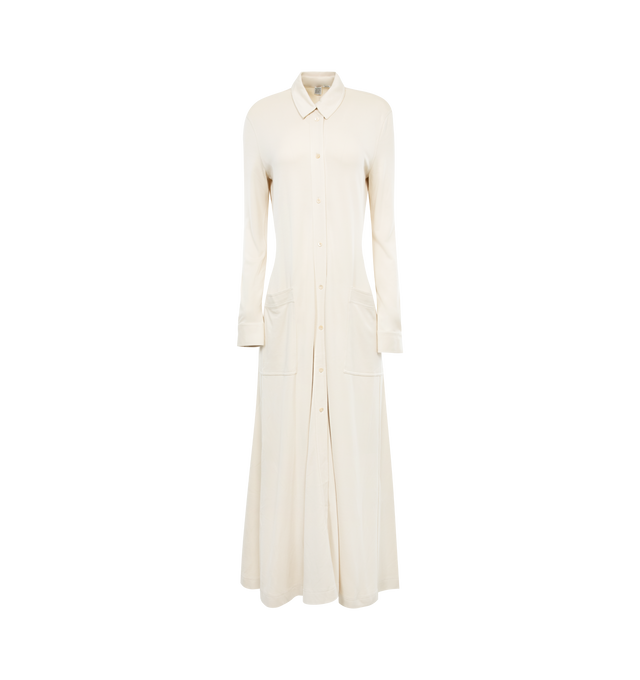 Image 1 of 2 - WHITE - TOTEME Flowing Jersey Shirtdress featuring buttoned placket and cuffs, patch pockets, long sleeves and maxi length. 96% viscose, 4% elastane. 