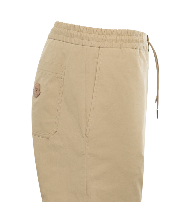 Image 3 of 3 - BROWN - MONCLER Gabardine Jogging Pants featuring lightweight cotton gabardine, drawstring waist, zipper and button closure, side slant pockets, back patch pocket and leather logo patch. 100% cotton. 