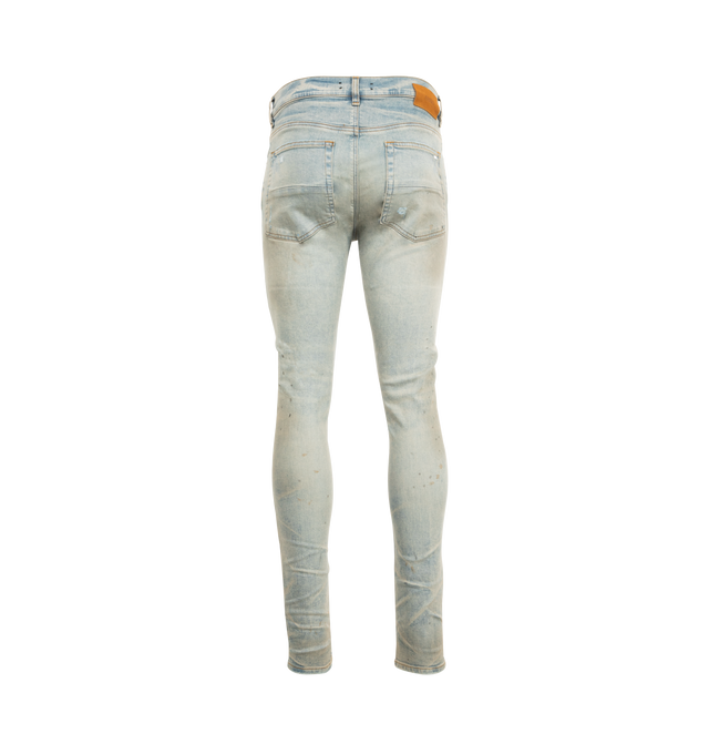 Image 2 of 3 - BLUE - AMIRI Stack Jeans featuring stretch denim, belt loops, five-pocket styling, button-fly, skinny leg, quilted leather patched at front, leather logo patch at back waistband and logo-engraved silver-tone hardware. 92% cotton, 6% elastomultiester, 2% elastane. Made in United States. 