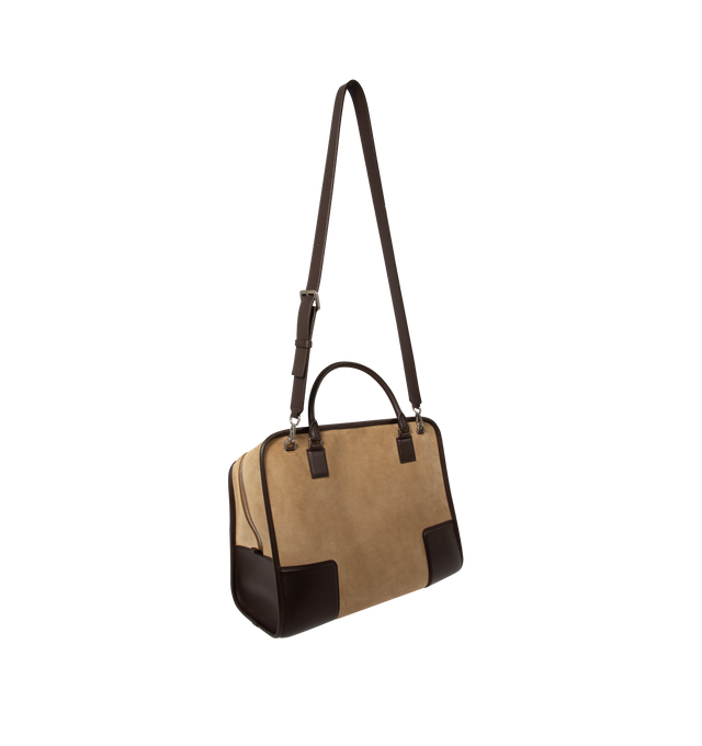 Image 4 of 5 - BROWN - Loewe Mens Amazona 180 XL Bag is crafted from suede with soft calfskin details. Features a relaxed silhouette, single toron top handle, removable shoulder handle, adjustable crossbody strap, zip closure with two leather pullers, two compartments with concealed magnetic closure, interior flat pocket, side D-ring, suede and nappa lambskin lining, palladium-tone hardware, and embossed LOEWE and Double L branding. Dimensions: 40  31  16 cm; Strap Length: 105133 cm; Strap Drop: 4761 cm; Ha 