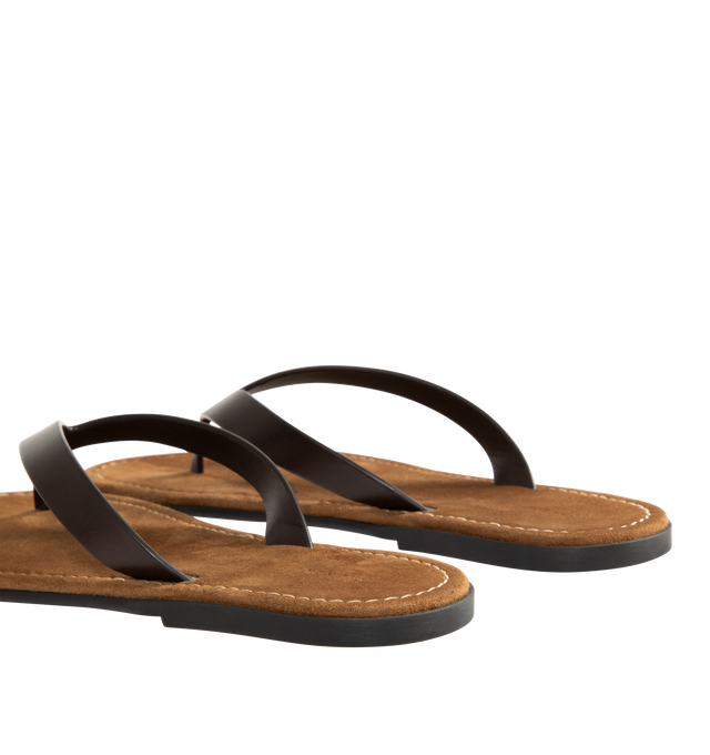 Image 3 of 4 - BROWN - THE ROW Beach Flip Flop featuring vegetable-tanned calfskin leather with seamless strap, padded goatskin insole and rubber sole. 100% calfskin leather. Synthetic sole. Made in Italy. 