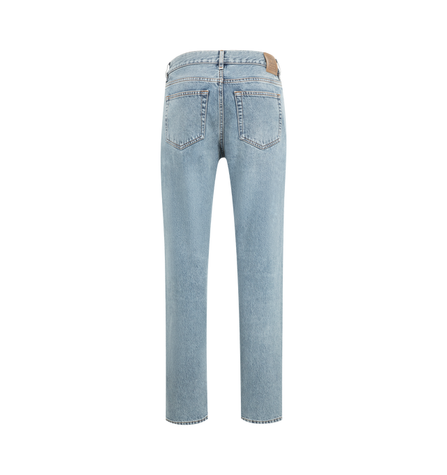 Image 2 of 3 - BLUE - Toteme versatile jeans cut to sit low on the waist and fall into straight legs for a relaxed, masculine silhouette softened by a light true vintage wash. Featuring zipper fly, silver-tone hardware,  five pockets, belt loops, finished hem and leather patch. 100% organic cotton. Made in Italy. 