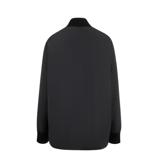 Image 2 of 3 - BLACK - The Row Oversized, lightly padded bomber jacket in soft technical nylon with dual zip closures, side seam pockets, and ribbed neck and cuffs. Lined in 100% cashmere flannel for added warmth. 100% Polyester lined in 100% Cashmere. Made in Italy. 