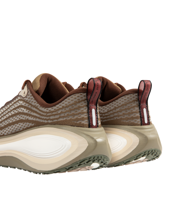 Image 3 of 5 - BROWN - NIKE Vomero Plus Sneaker featuring mixed textile upper, ultra-responsive ZoomX cushioning, high-abrasion rubber outsole, webbed lace loops for an adjustable fit and reflective details. 
