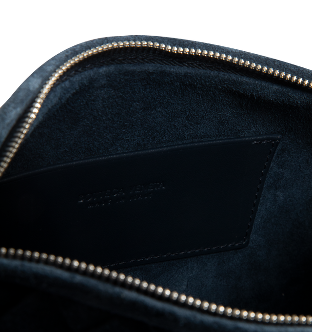 Image 3 of 3 - NAVY - BOTTEGA VENETA Traveler Phone Pouch featuring intrecciato suede leather phone pouch, adjustable cross-body strap, one main compartment, one flat inside pocket and zip closure. Calfskin. Lining: suede. 4.7" x 7.9" x 2.2". Made in Italy.   