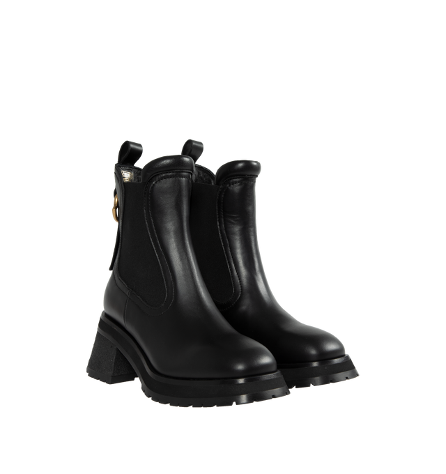 Image 2 of 4 - BLACK - MONCLER Gigi Chelsea Boots featuring a flared heel, logo outline-shaped hardware, leather upper, leather insole, leather-covered welt, l eather-covered heel, micro rubber midsole and rubber tread. Sole height 7 cm. 70% polyester, 30% elastodiene. Leather. Made in Italy. 