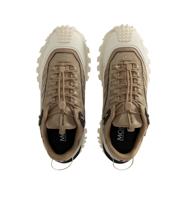 Image 5 of 5 - WHITE - Moncler Trailgrip GTX Low Top Sneakers are a lace-up style with a mix of technical materials, GORE-TEX waterproof membranes, EVA midsoles, Vibram treads, and OrthoLite insoles. Made in Vietnam. 