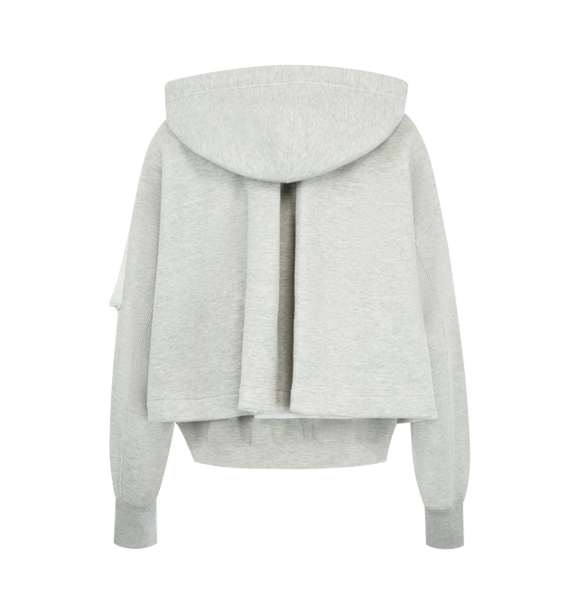 Image 2 of 3 - GREY - SACAI Sponge Sweat x Nylon Twill Hoodie featuring padded cotton-blend jersey hoodie, drawstring at hood, two-way zip closure, logo-engraved press-stud tab at chest, concealed welt pockets, rib-knit hem and cuffs, cropped hem, utility pocket and pen slots at sleeve, dropped shoulders and nylon satin underlay. 62% cotton, 38% polyester. Lining: 55% polyester, 44% cotton, 1% polyurethane. Fill: 100% polyester. Made in Japan. 