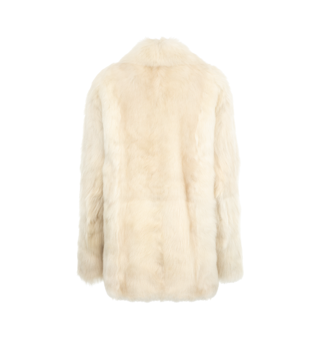 Image 2 of 3 - WHITE - Khaite jacket that combines the ease of the 1970s with silky Toscana shearling. Boldly scaled collar, flap pockets, and lining of silky cupro twill. Toscana (100% lambskin shearling), lined in cupro twill (100% cupro). 