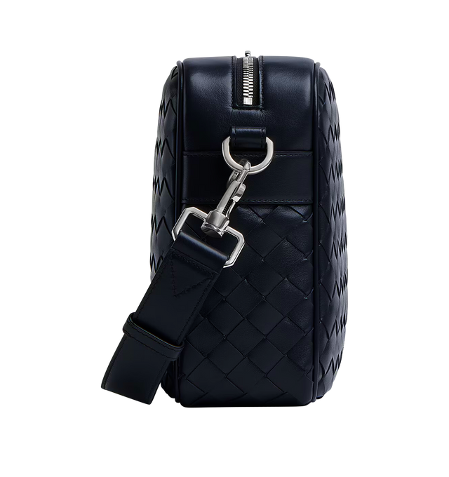 Image 3 of 4 - NAVY - BOTTEGA VENETA Intrecciato Camera Bag featuring cross-body bag in Intrecciato leather with detachable strap, metal D-ring, one interior zipped pocket with leather trimming, one open pocket in canvas and zipper closure. 7.7" x 11.4" x 3". Calfskin. Lining: canvas. Made in Italy.   