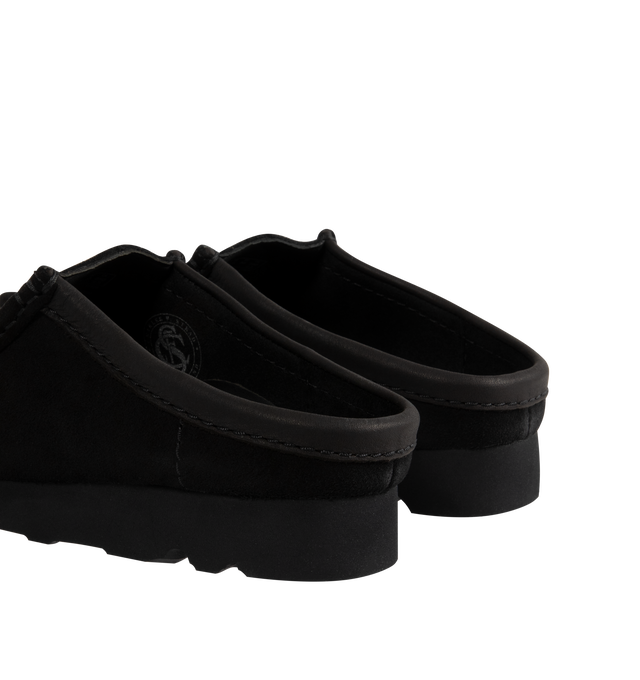 Image 3 of 4 - BLACK - CLARKS Wallabee Slip Shoes featuring suede upper, lightweight Vibram sole, tonal leather collars and Clarks Originals heat-embossed metallic transfer on sock bed. 