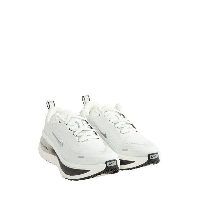 Image 2 of 5 - WHITE - Nike Women's Vomero Plus Running Shoes are engineered with a full-length ZoomX foam midsole and feature Nike's highest level of cushioning for an ultra-soft, responsive ride. Designed for everyday road running, this max-cushion silhouette combines a breathable engineered mesh upper with a high-stack platform and durable rubber outsole for lasting comfort and traction. Main Material: Engineered Mesh. Midsole: Full-Length ZoomX Foam. Outsole: High-Abrasion Rubber. Weight: Approx. 242 g  