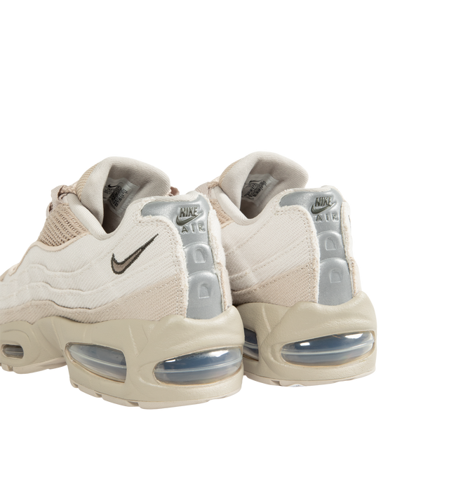 Image 3 of 5 - NEUTRAL - Nike Men's Air Max 95 Big Bubble Sneaker featuring textile and synthetic leather, visible Max Air cushioning, flex grooves in the midsole and outsole, foam midsole and rubber outsole. 