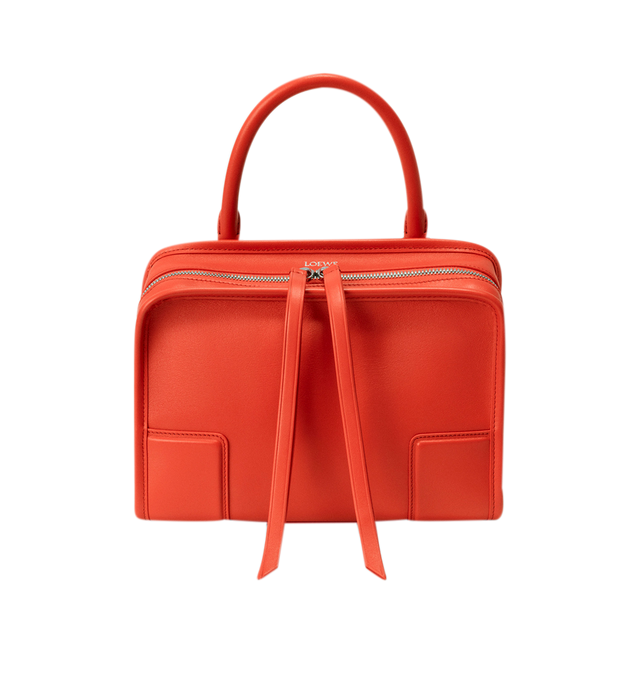 Image 6 of 17 - ORANGE - Loewe Small Amazona 180 Bag in leather features a relaxed silhouette anchored by a single toron top handle, designed to be carried open, while a concealed closure secures the main compartment, three carry options: short handle, removable shoulder strap and crossbody, zip closure with two leather zip pullers, two compartments, main compartment closed with magnetic closure, internal flat pocket, left side d-ring for customization, nappa lambskin lining, and embossed double L branding. 