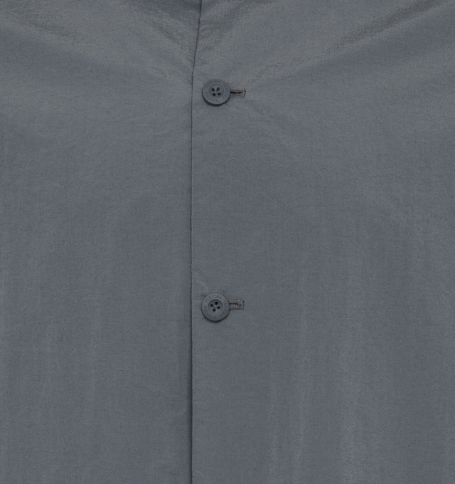 Image 3 of 3 - GREY - Teatora Packable Wide Shirt has a classic collar, button front closure, a curved hem, button cuffs, and it is crafted in quick-drying wrinkle-resistant fabrics. 100% nylon.  