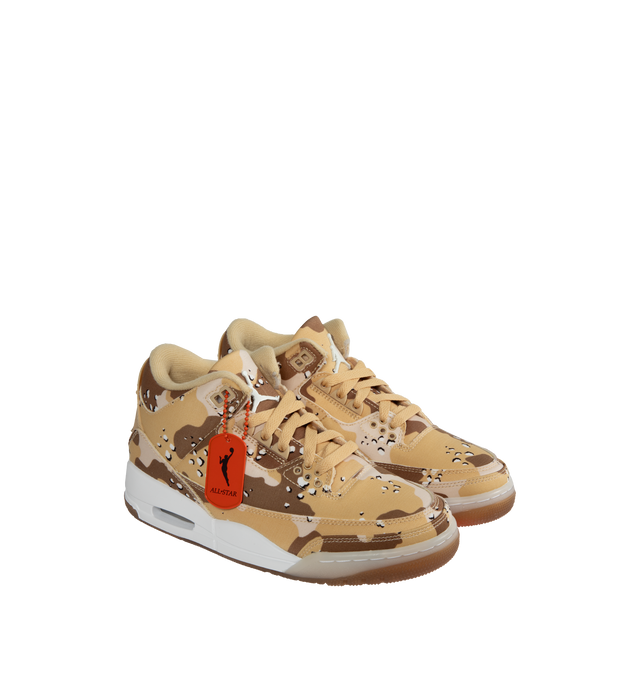 Image 2 of 5 - NEUTRAL - Women's Air Jordan 3 lace-up sneakers with  Desert Camo textile upper, raised Jumpman logo at the tongue, vibrant hits of Brilliant Orange on the bottom of the sole, plus a coordinating dog tag accessory. 