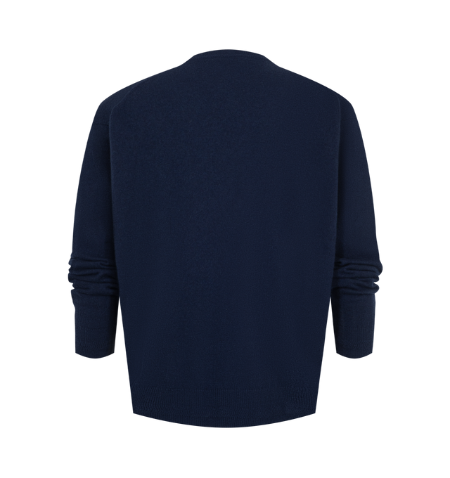 Image 2 of 2 - BLUE - Jil Sander Men's Wool Blend V-Neck Sweater is crafted from a wool-blend knit and features a regular-fit silhouette with padded shoulders. Designed with a clean V-neckline and the brand's signature minimalist aesthetic, the sweater offers a refined interpretation of classic knitwear. Main Material: Wool Blend. Made in Italy. 