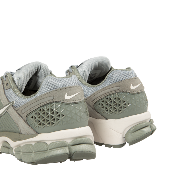 Image 3 of 5 - GREEN - NIKE ZOOM VOMERO 5 lace-up sneakers featuring grey mesh with TecTuff and grey utilitarian overlays that are breathable and durable, cushlon foam with Zoom Air cushioning and rubber tread. 