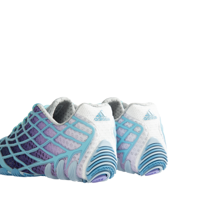 Image 3 of 5 - BLUE - Adidas x Bad Bunny F50 Ghost Sprint Sneakers are crafted with a streamlined low-top silhouette and feature speed-inspired design elements, signature Bad Bunny collaboration details, lace-up fastening, and a durable rubber sole. These designer sneakers combine football-inspired heritage with contemporary streetwear styling for elevated everyday wear. Main Material: Textile and Synthetic Upper. Sole: Rubber. 